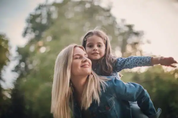 happy mum and daughter following mediation to resolve parental alienation Exeter